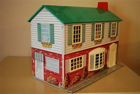 doll house metal tin with furniture|vintage tin doll houses 1960.